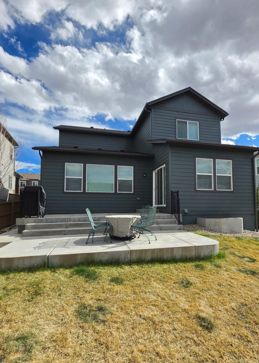house exterior with dark teal siding after repaint Preview Image 2