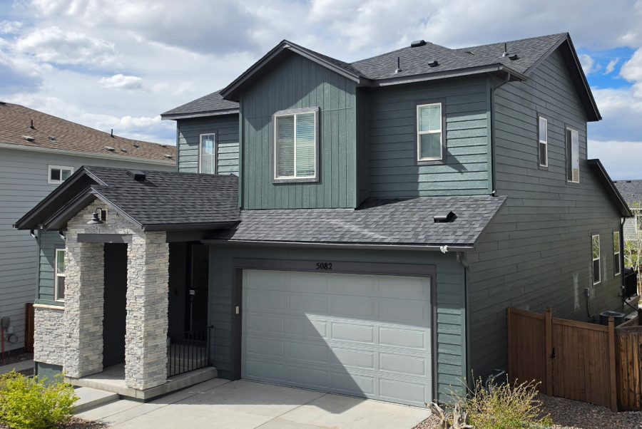 house exterior with dark teal siding after repaint Preview Image 1