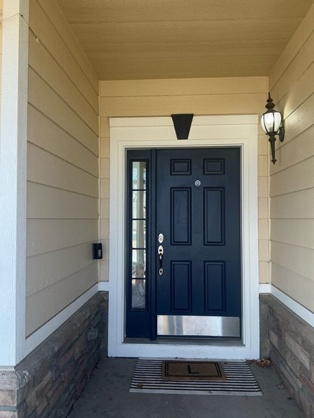dark front door of house with tan siding Preview Image 8