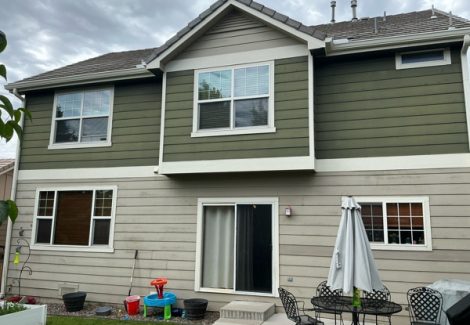 back of home with two tone color siding