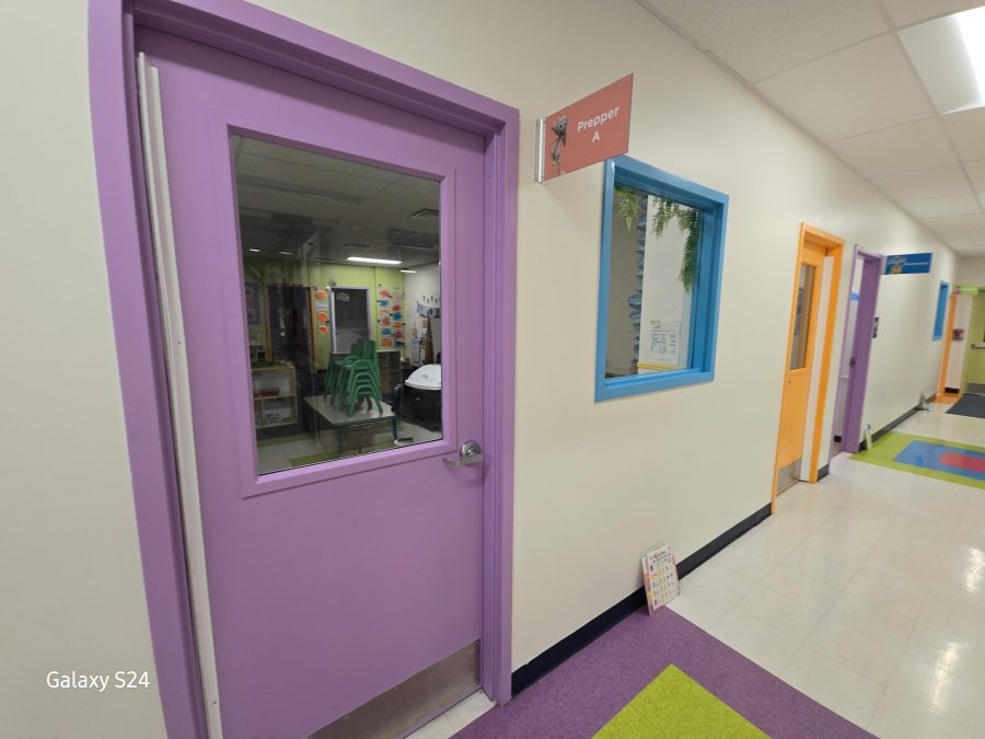 preschool hallway with colorfully painted classroom doors Preview Image 11