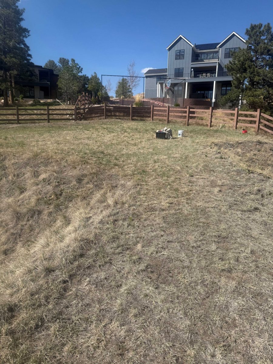 stained split rail fence surrounding residential neighborhood Preview Image 3