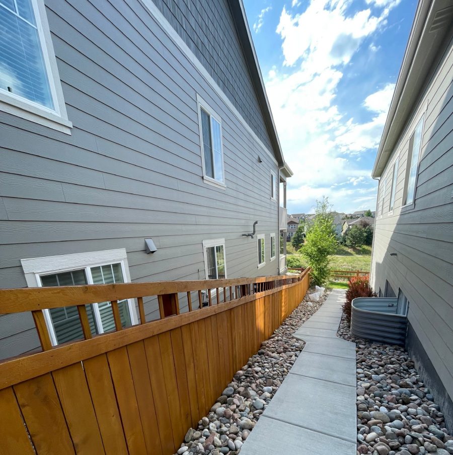stained fence surrounding house and yard Preview Image 1