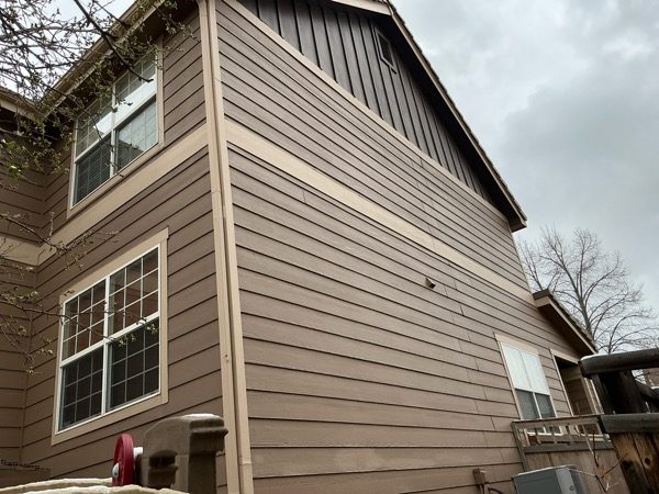 front corner of house with brown siding Preview Image 4