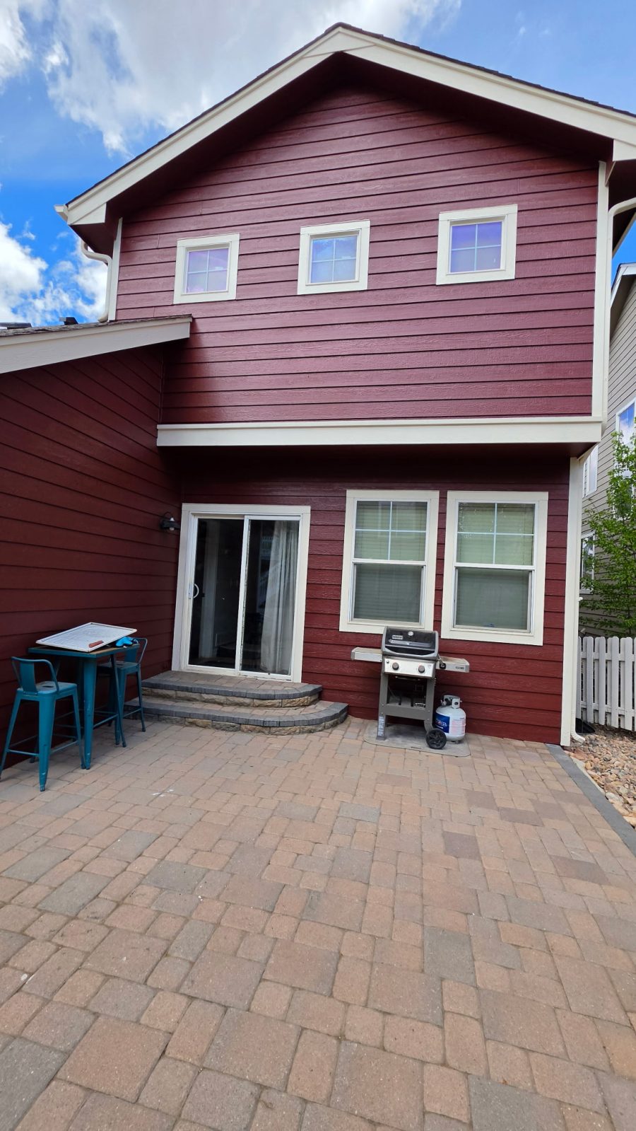 house exterior with dark red painted siding and white trim Preview Image 6
