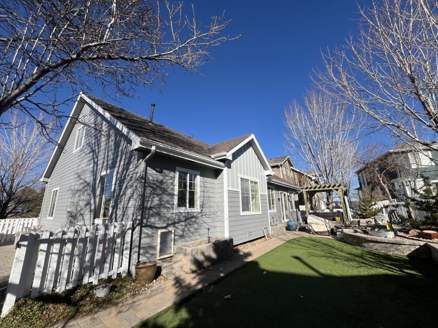 front of painted house with yard Preview Image 1