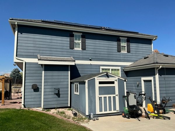 house and shed with aged blue siding Preview Image 4