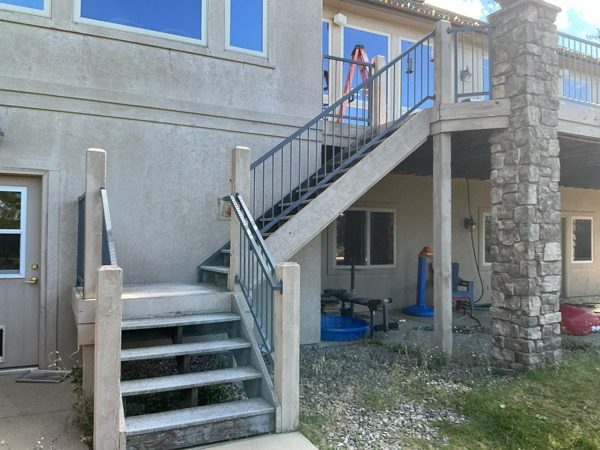 exterior staircase of stucco home before repaint Preview Image 6