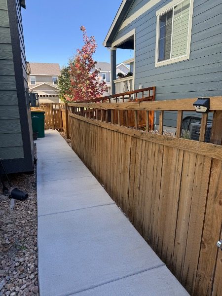 wooden fence surrounding house before restain Preview Image 6