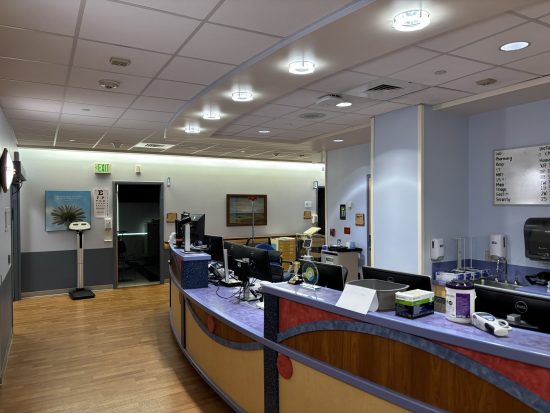 medical facility desk area after wall repaint