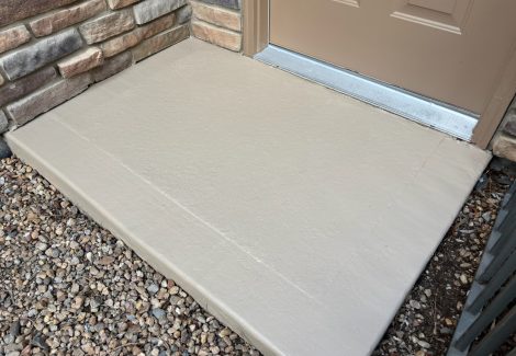 coated concrete pad outside home front door