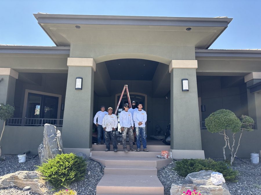 painting crew in entryway of painted stucco home Preview Image 5