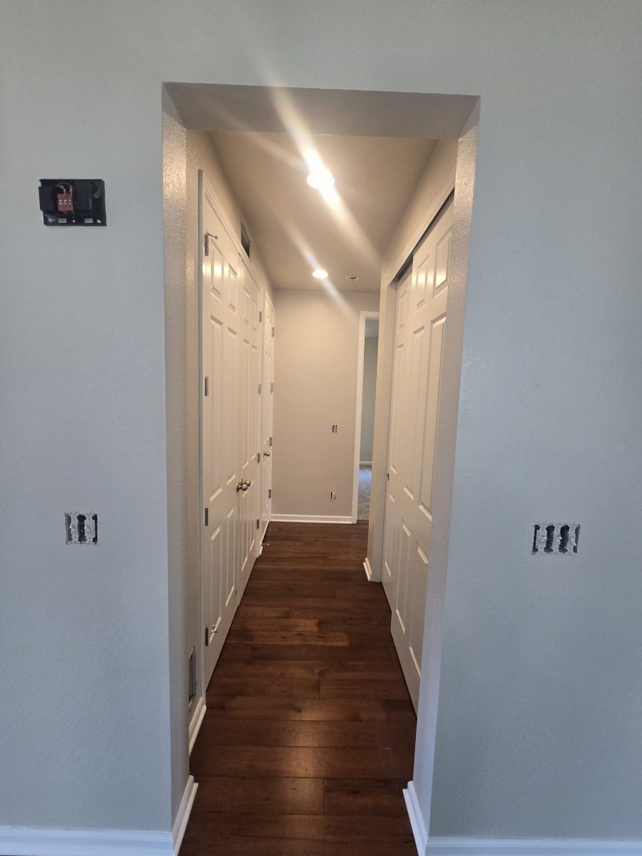 white hallway with wooden floors Preview Image 4