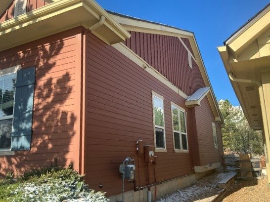 exterior of house with red siding Preview Image 5