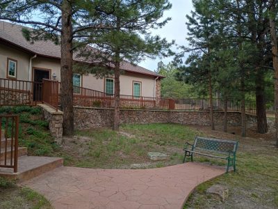 house exterior with wrought iron fence