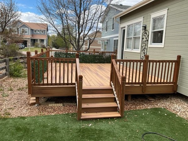 clear stained wooden deck attached to house Preview Image 4