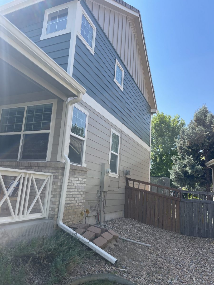 side of house with green and tan siding Preview Image 2