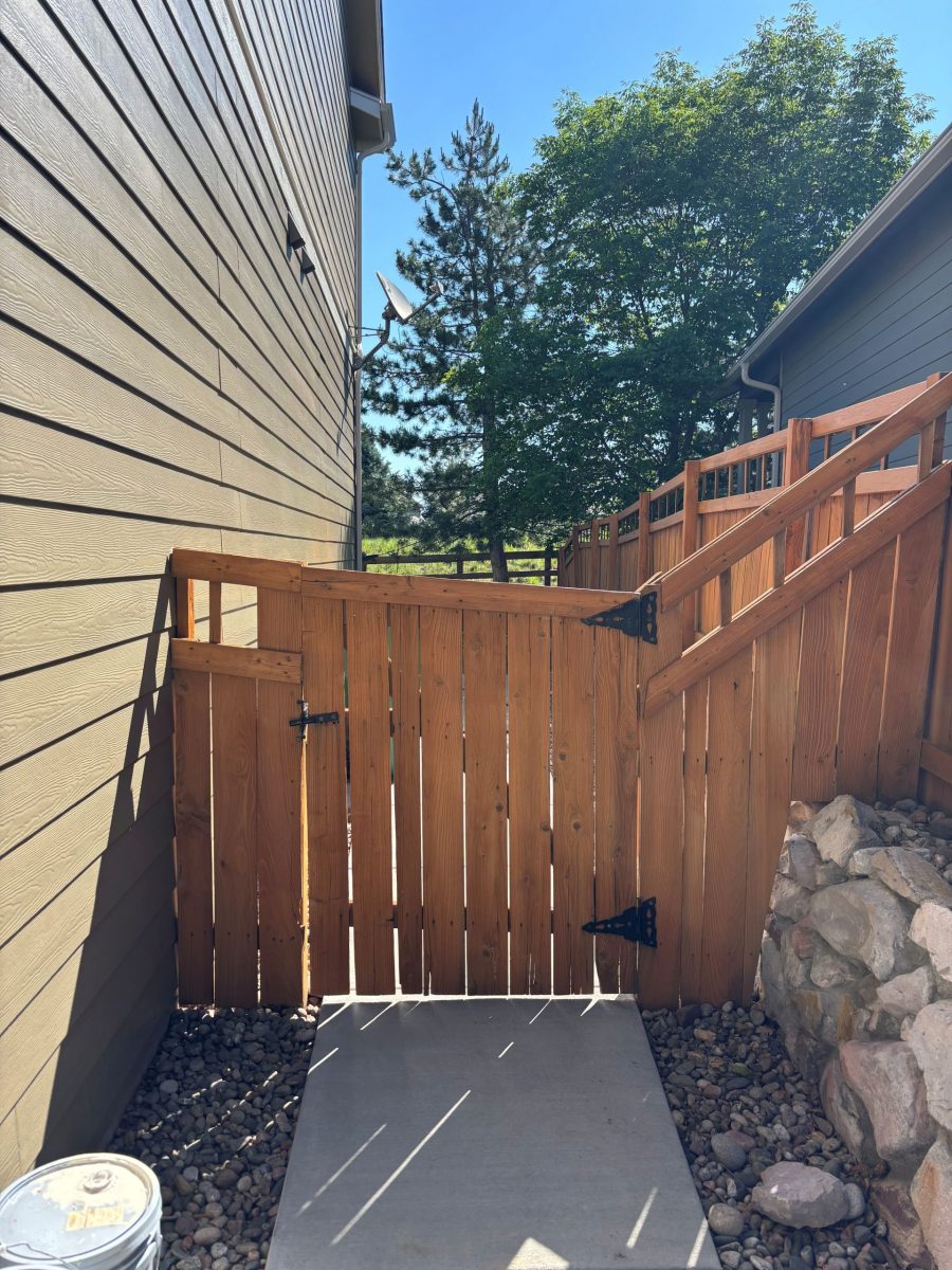 stained wooden fence attached to house Preview Image 2