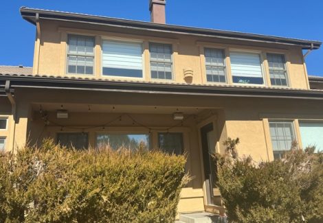 front of stucco house