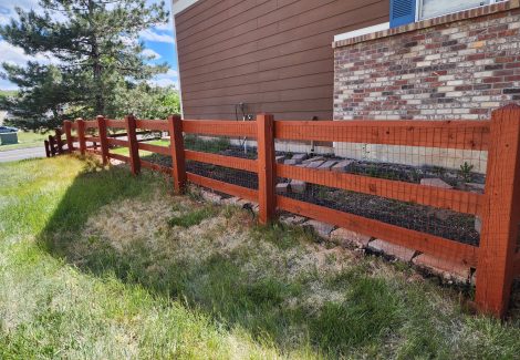 repainted split rail fence