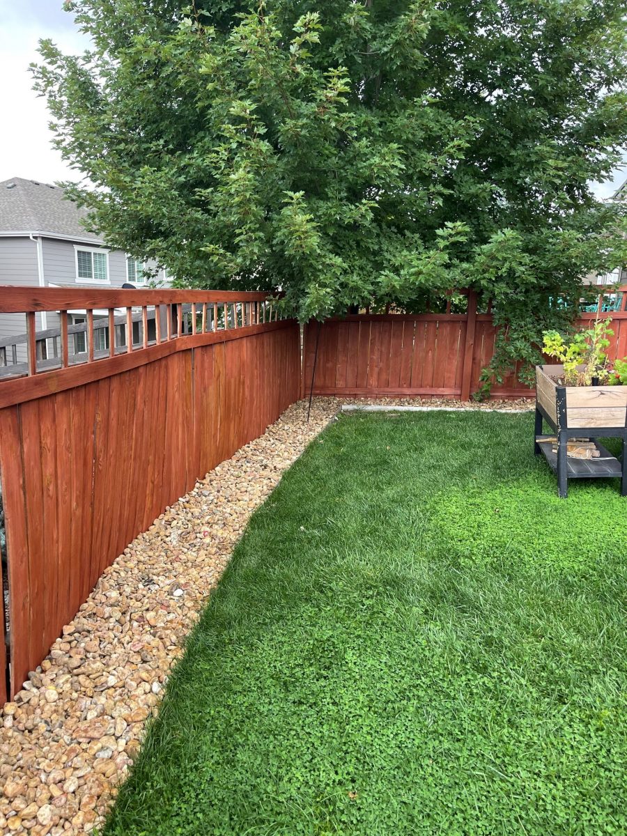 stained wooden fence surrounding yard Preview Image 3