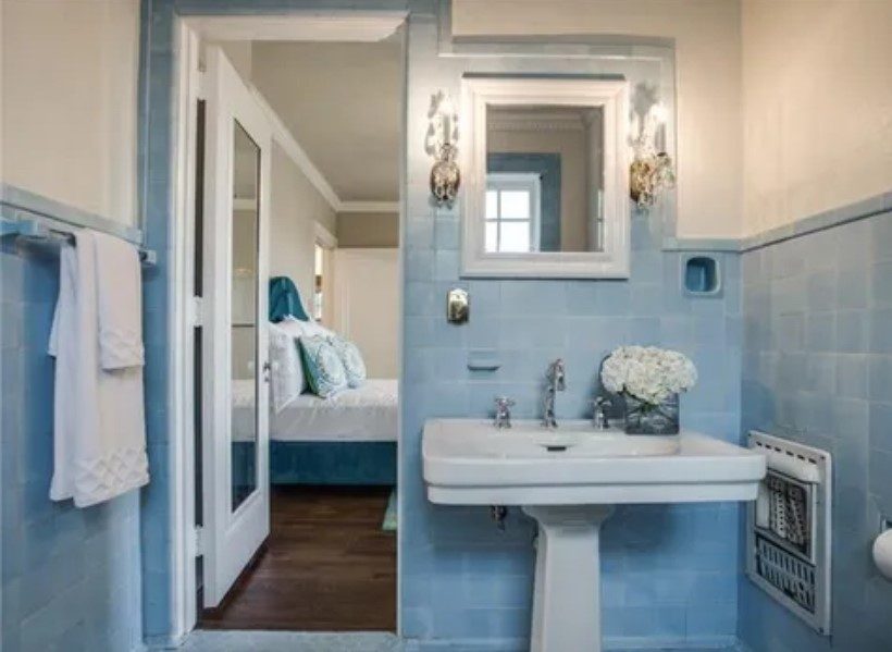 blue tiled bathroom with view into bedroom Preview Image 2