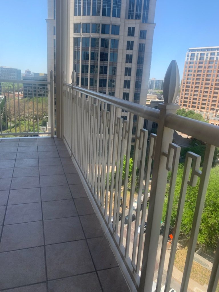 Balcony Power-washed and Painted Hand Rails a beige color to match the wall color Preview Image 1