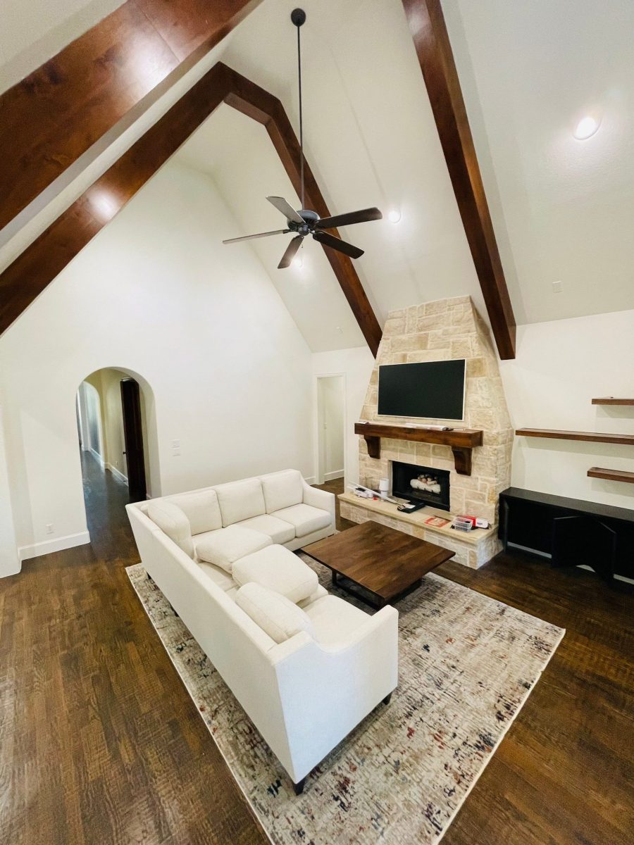 living room with vaulted ceiling and fireplace Preview Image 6