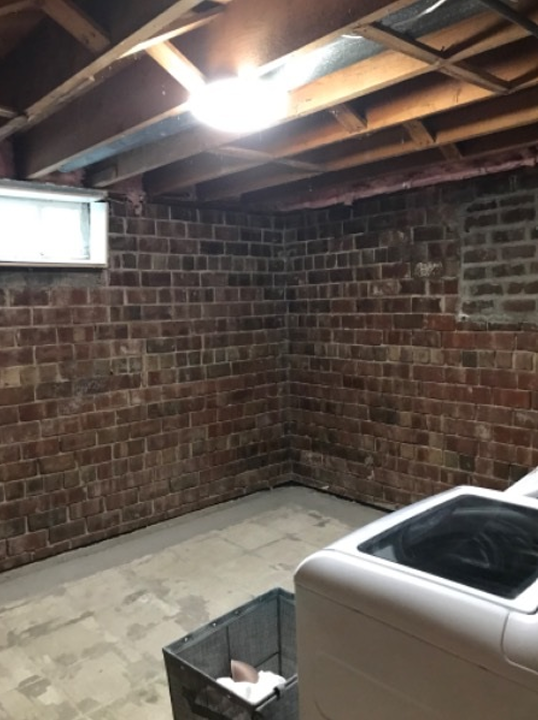 washer and dryer in brick-walled room Preview Image 7