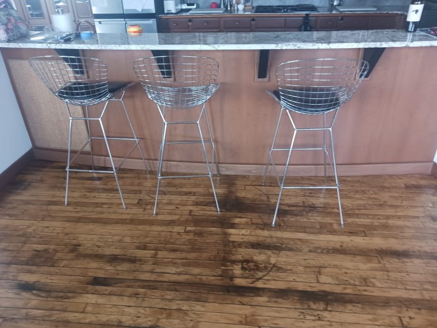 stool chairs under kitchen counter with wood paneled wall Preview Image 4