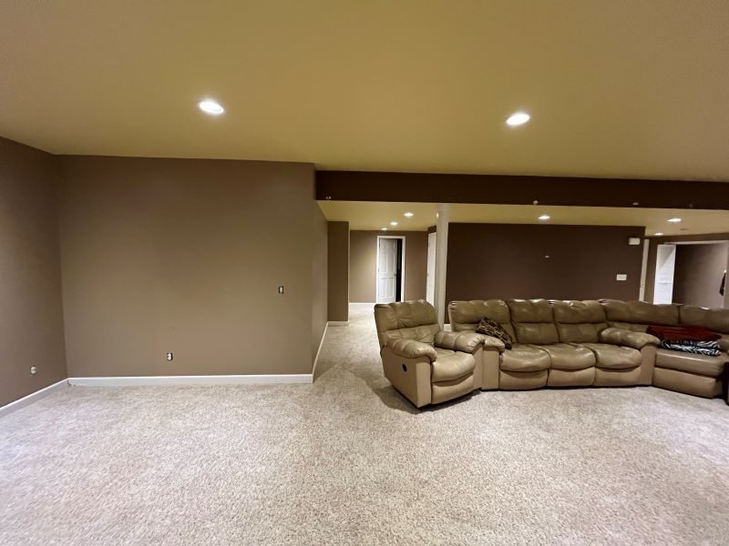 room with large couch Preview Image 3