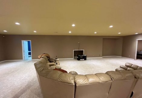 room with large sectional couch