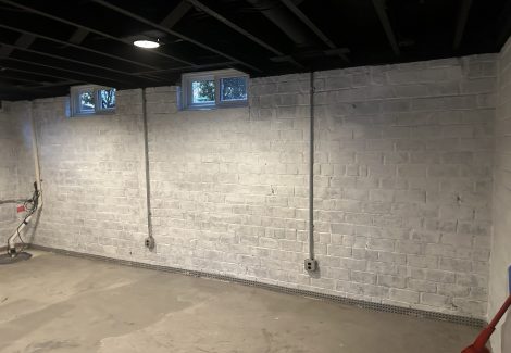 whitewashed brick wall