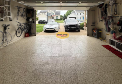 home garage with coated floor
