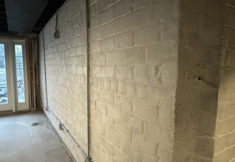 whitewashed brick wall