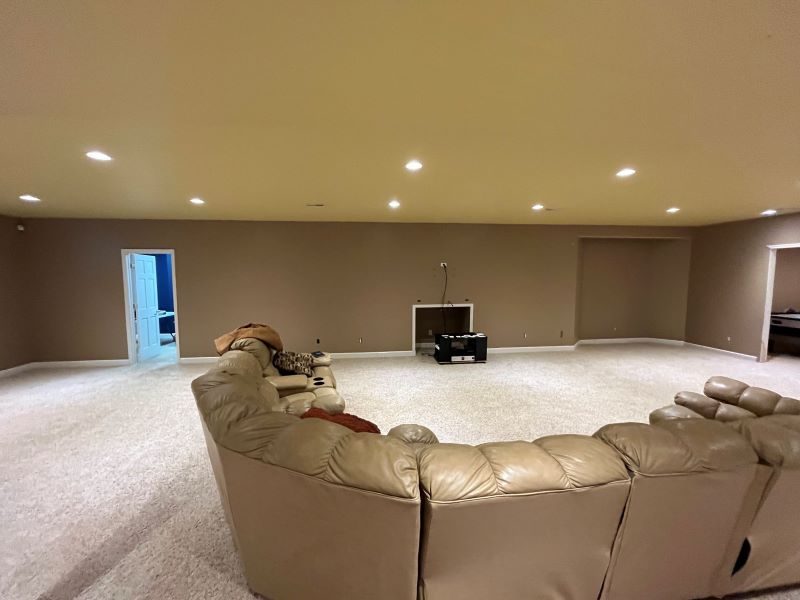 room with large sectional couch Preview Image 5