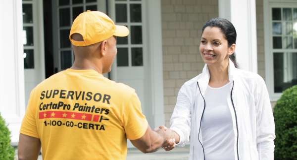 Paint contractor inspecting work