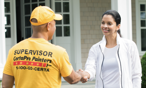 Paint contractor inspecting work
