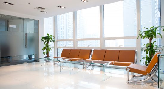 Commercial Interior painting lobby with orange chairs