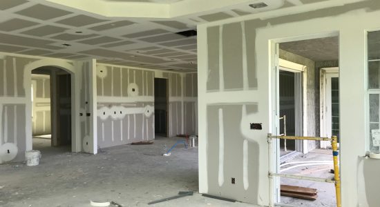 Commercial Drywall repair and repainting inside of an apartment complex in Central Miami