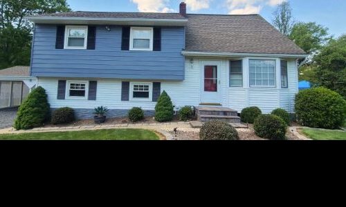 clean work area repainted house exterior