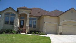 Exterior house painting by CertaPro painters in Rogers Ranch, TX
