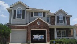 Exterior house painting by CertaPro painters in Stone Oak, TX