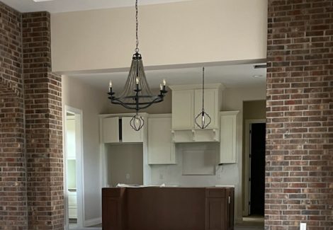 kitchen with island and chandelier