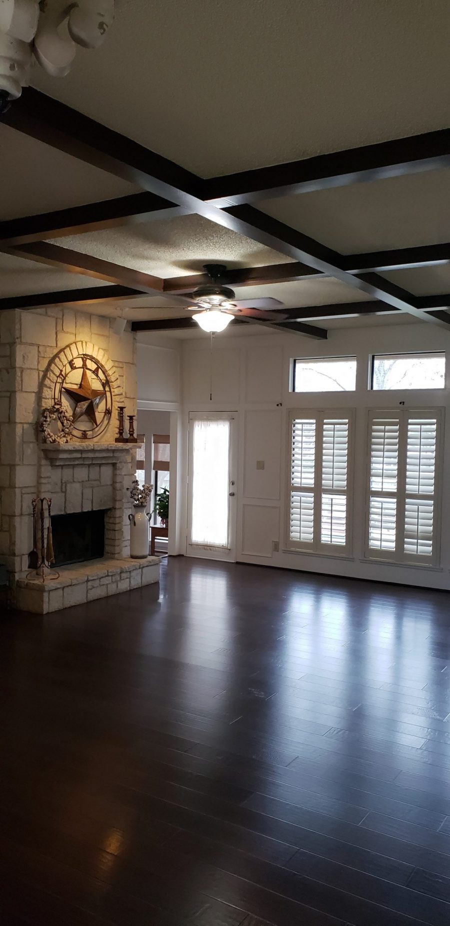 white painted living room with exposed wooden beams Preview Image 7