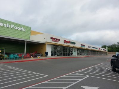 exterior view of painted storefront from parking lot
