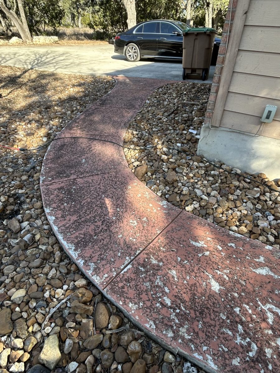 concrete walkway with worn red paint Preview Image 4