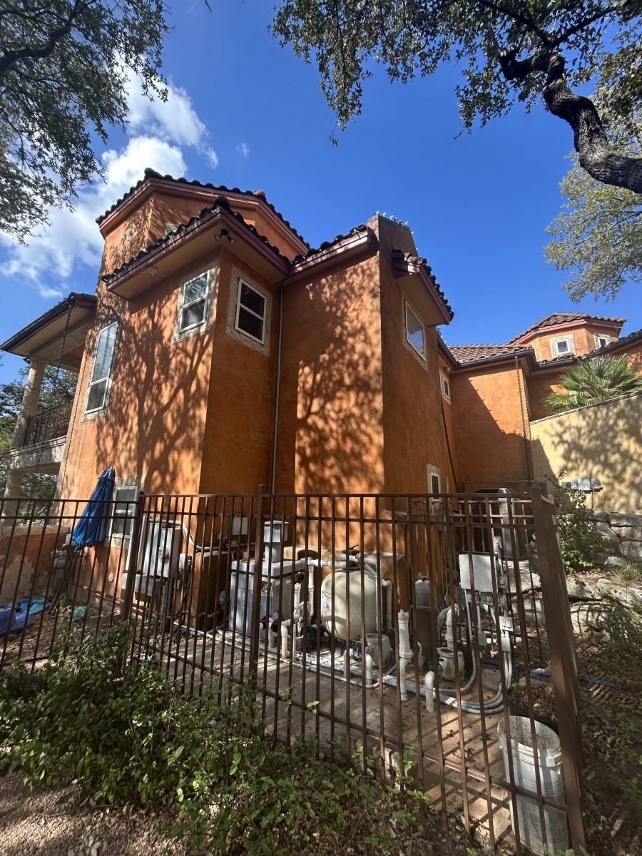 rust colored mision style stucco house exterior before repaint Preview Image 11
