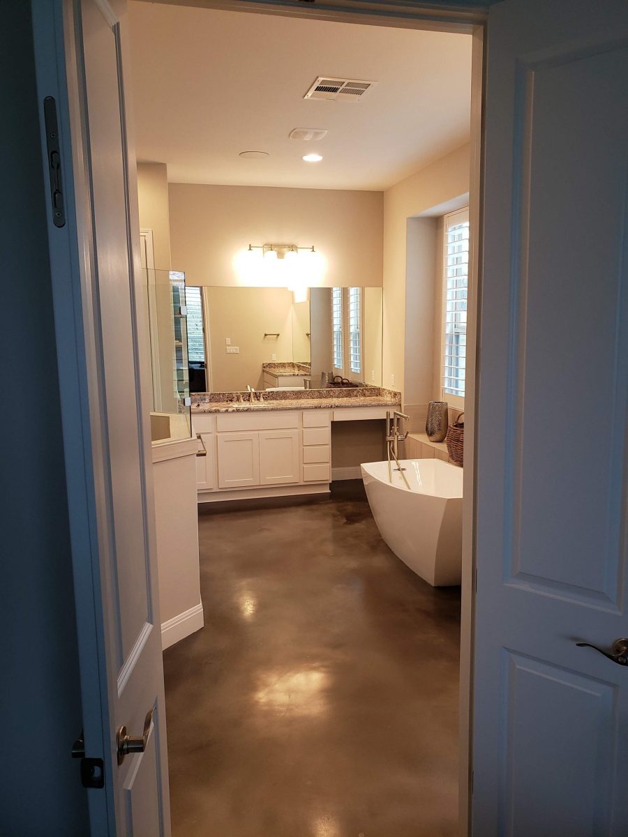 white painted bathroom with soaking tub lights on Preview Image 5