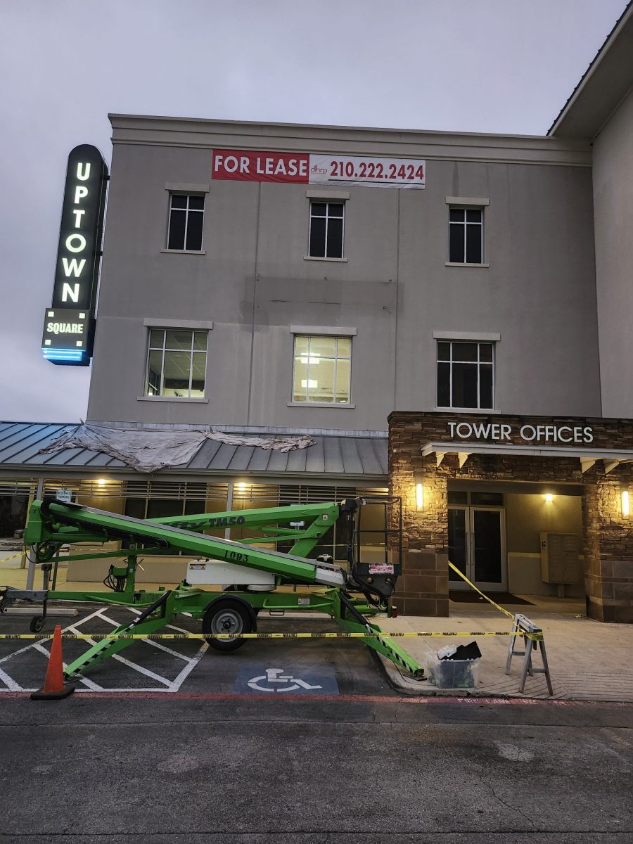 boom lift in front of office building Preview Image 1